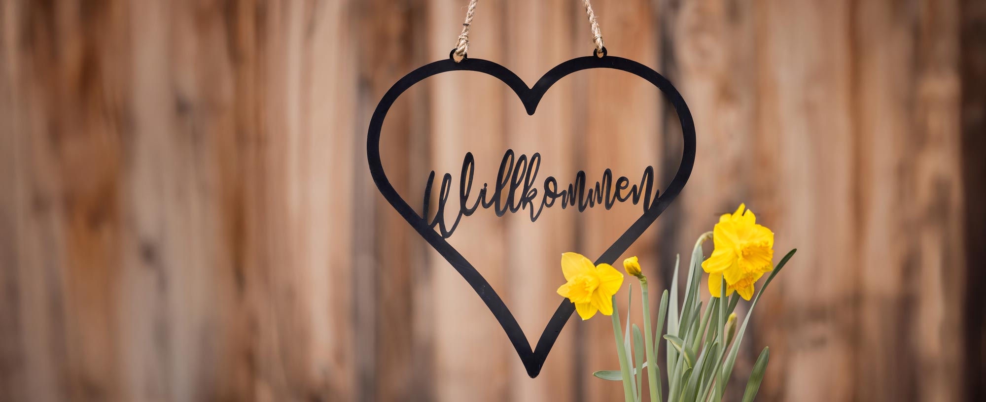 Herzlich Willkommen mit Blumen - freundliche Kontaktaufnahme